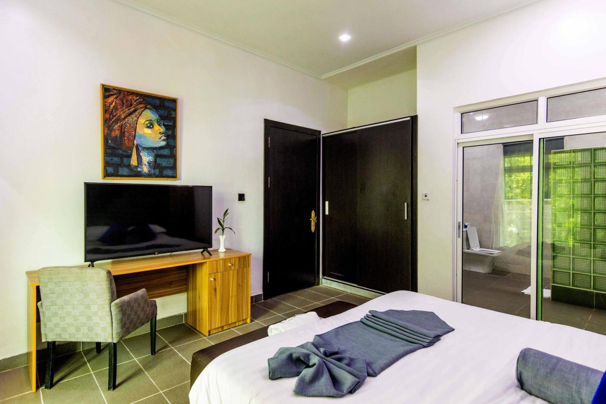 Nelson Mandela Gardens Hotell Okpanam Exteriör bild